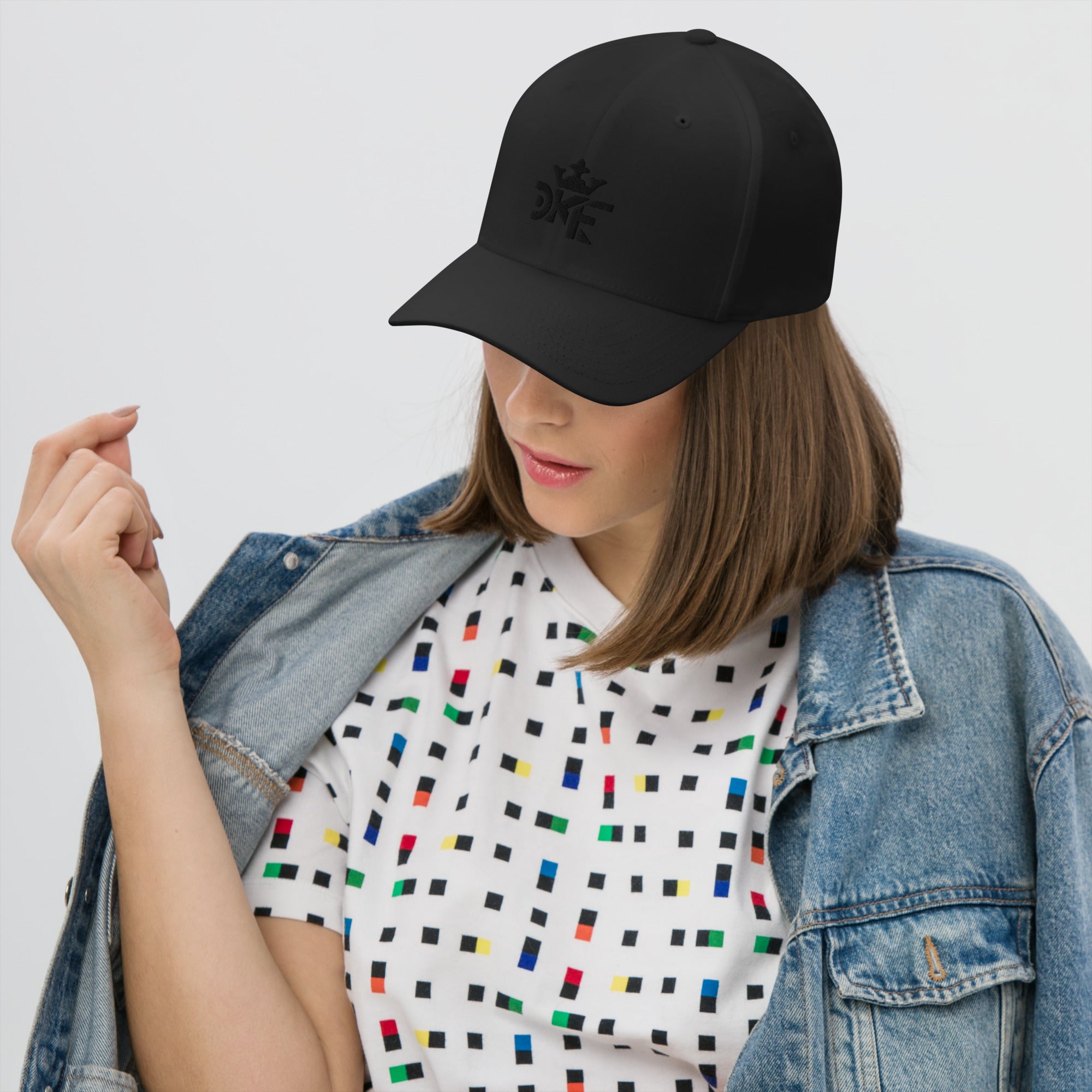 DKF unisex twill cap with embroidered Kingdom design.