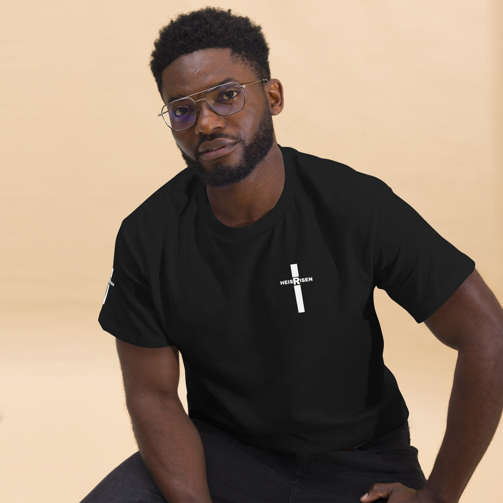 Black Christian resurrection T‑shirt with HE IS RISEN design inspired by 1 Peter 1:3.