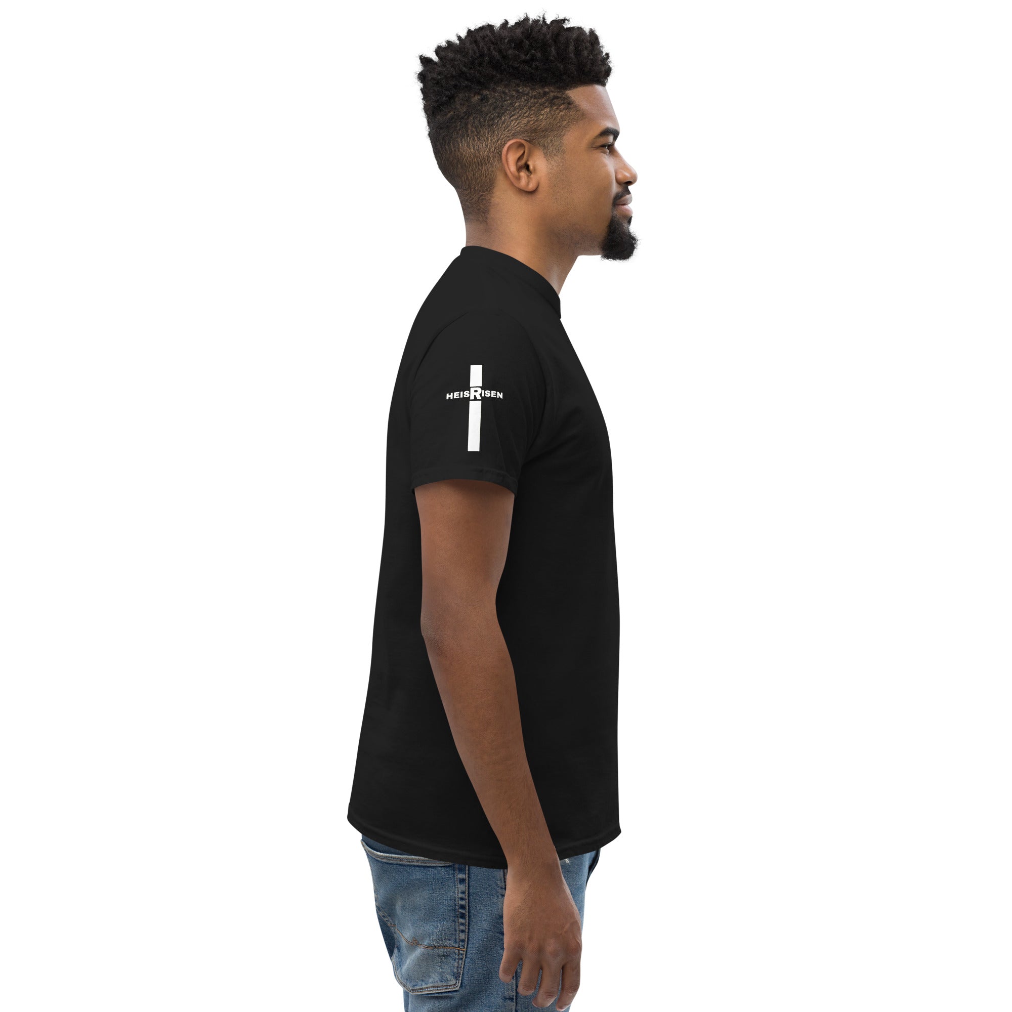 Black Christian resurrection T‑shirt with HE IS RISEN design inspired by 1 Peter 1:3.