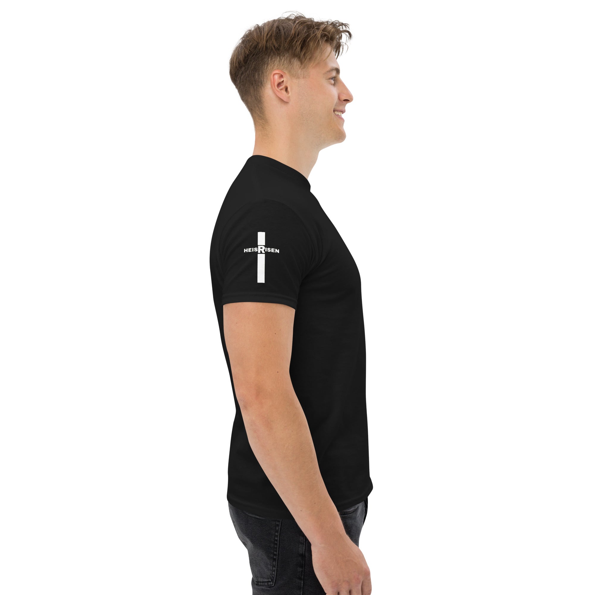 Black Christian resurrection T‑shirt with HE IS RISEN design inspired by 1 Peter 1:3.