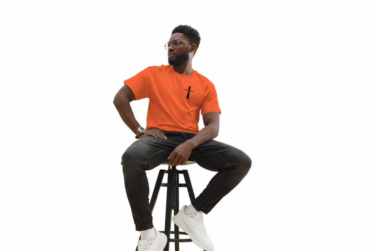 DKINGDOMFASHIONS red HE IS RISEN shirt declaring the resurrection.