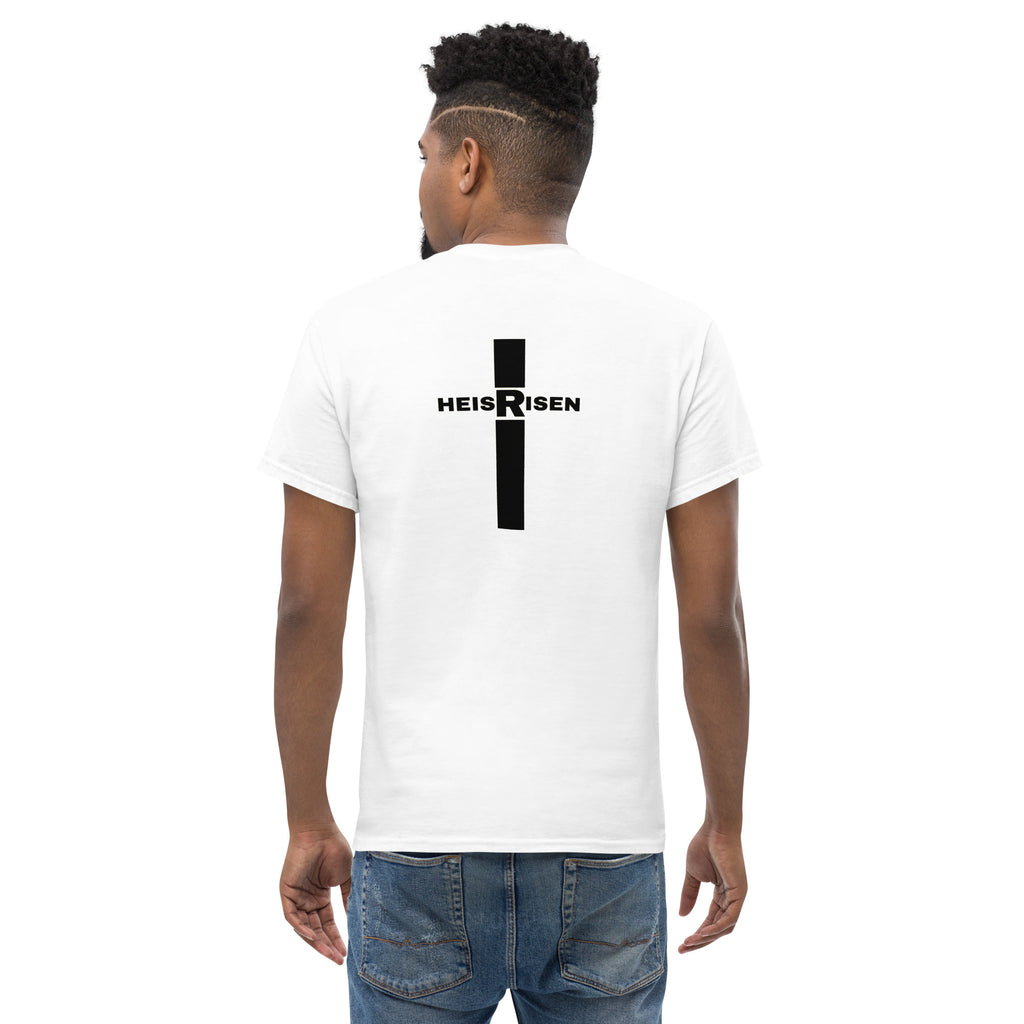 Christian Easter T‑shirt with “HE IS RISEN” design, inspired by 1 Peter 1:3 and celebrating the daily reality of Christ’s resurrection.