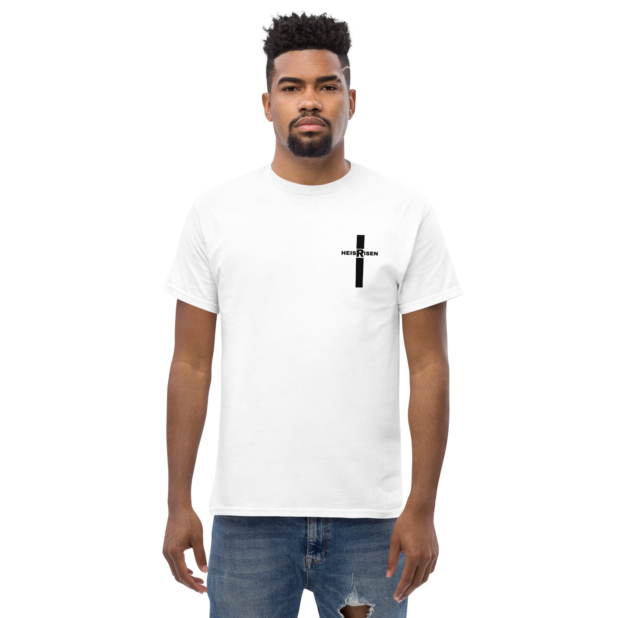 Christian Easter T‑shirt with “HE IS RISEN” design, inspired by 1 Peter 1:3 and celebrating the daily reality of Christ’s resurrection.