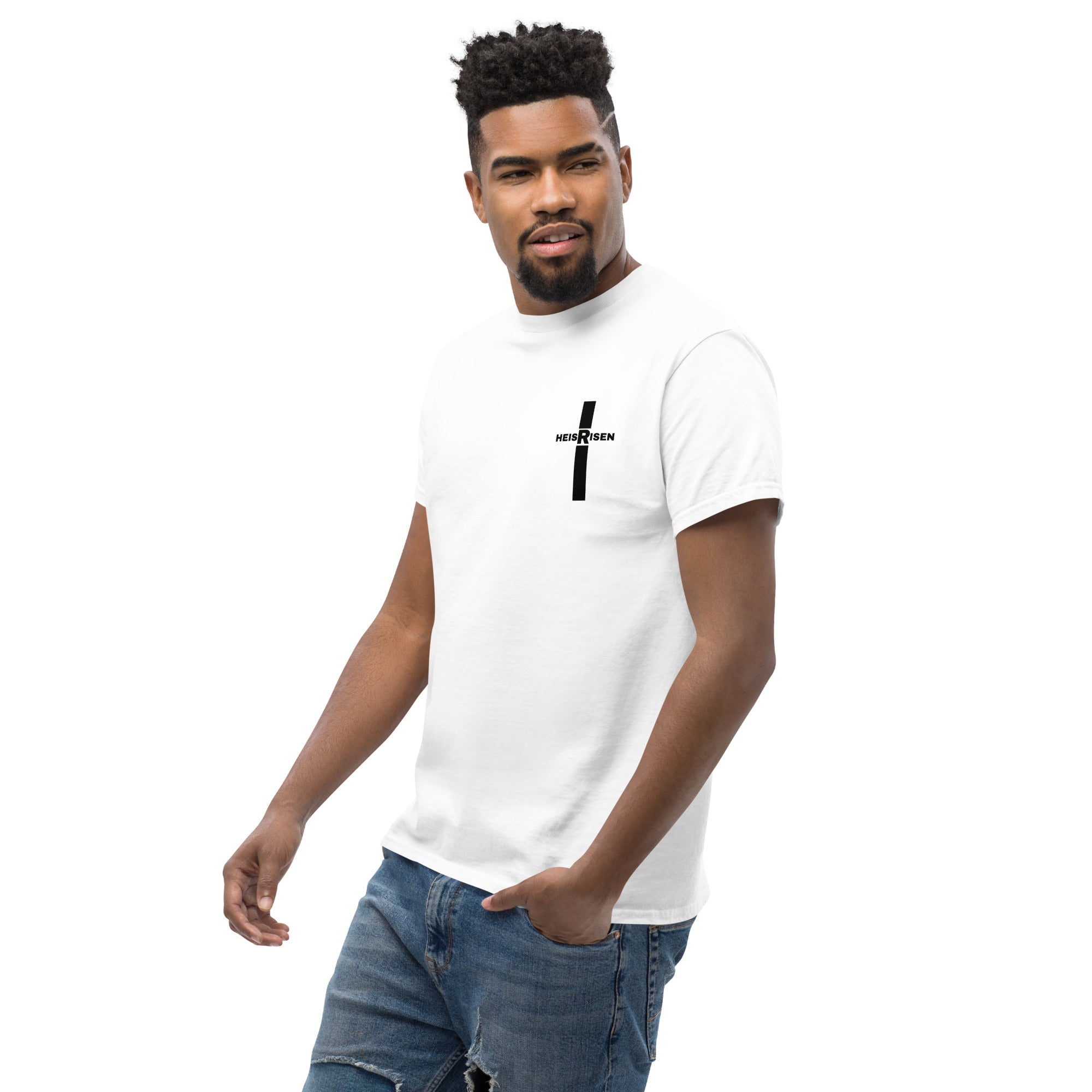Christian Easter T‑shirt with “HE IS RISEN” design, inspired by 1 Peter 1:3 and celebrating the daily reality of Christ’s resurrection.