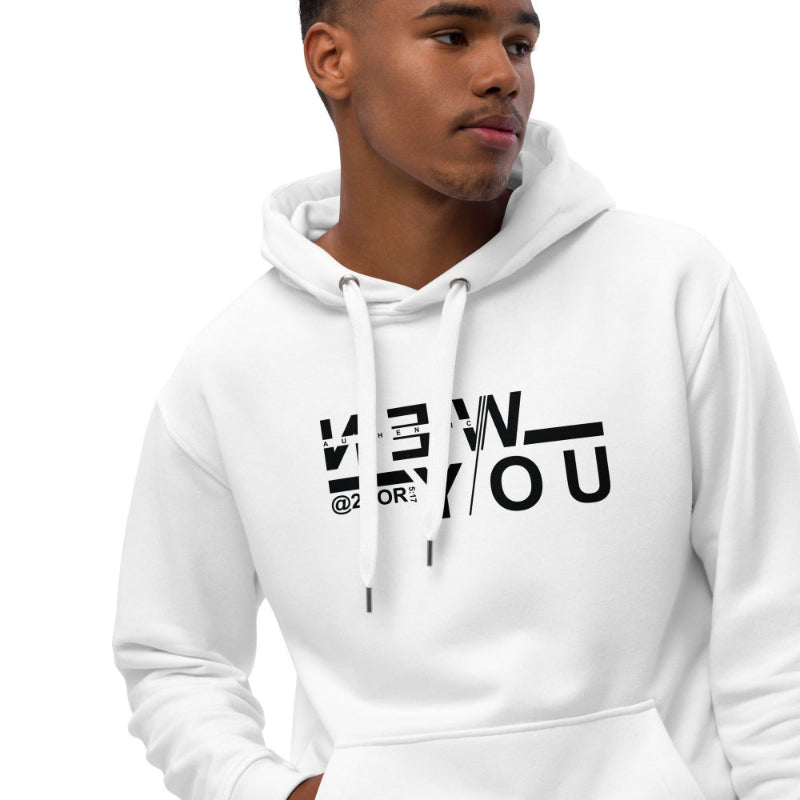 Person wearing a white hoodie with black text design on a white background