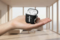 HE IS RISEN Christian AirPods case with carabiner.