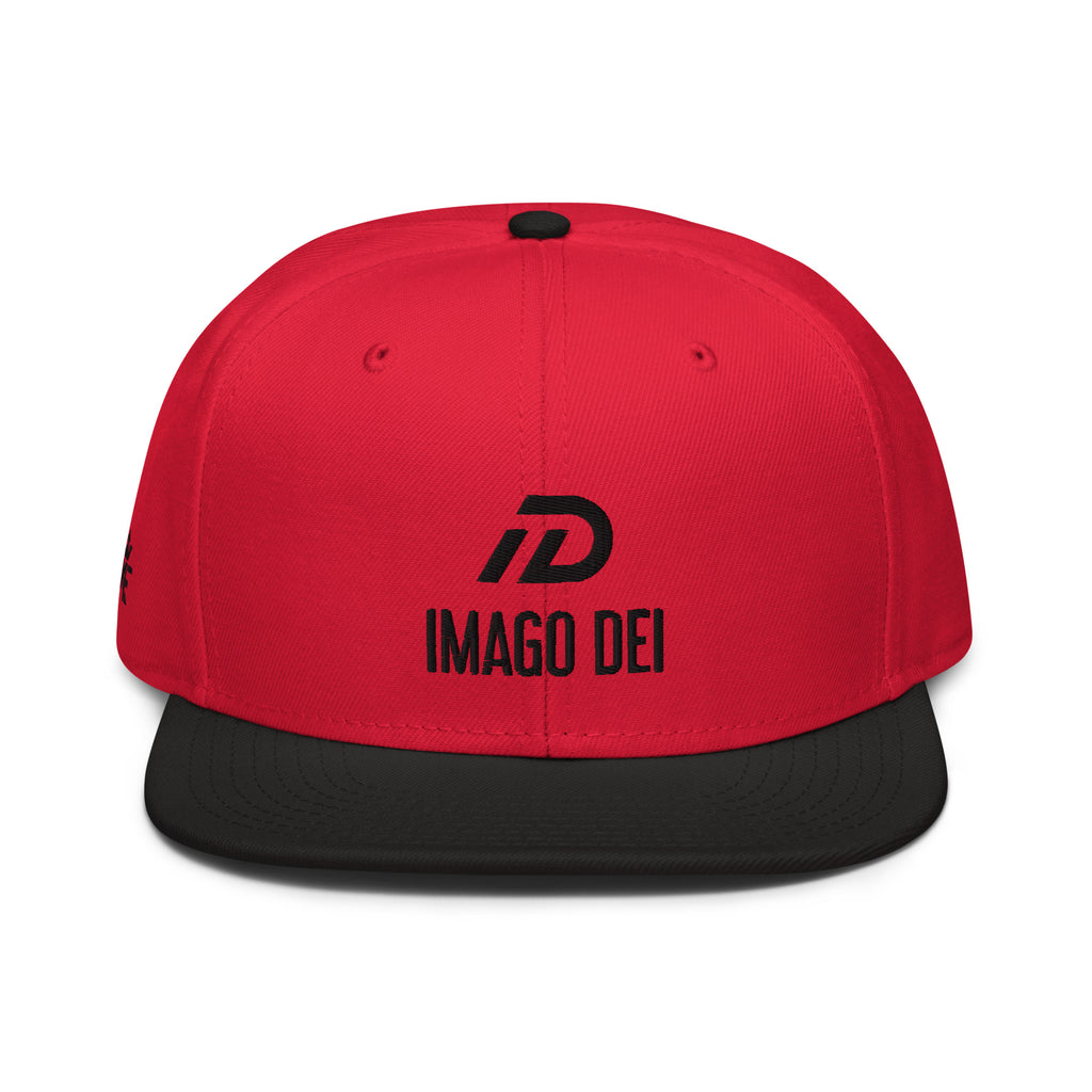 Black and red IMAGO DEI snapback hat with red embroidery — Christian streetwear.
