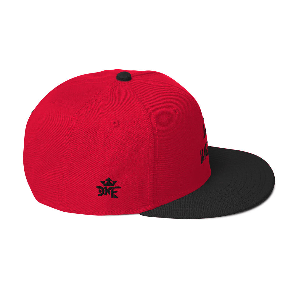 Black and red IMAGO DEI snapback hat with red embroidery — Christian streetwear.