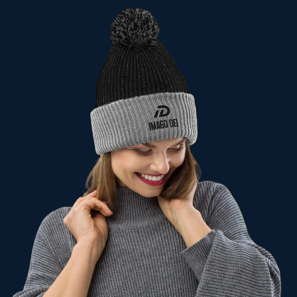 IMAGO DEI POM-POM BEANIE.